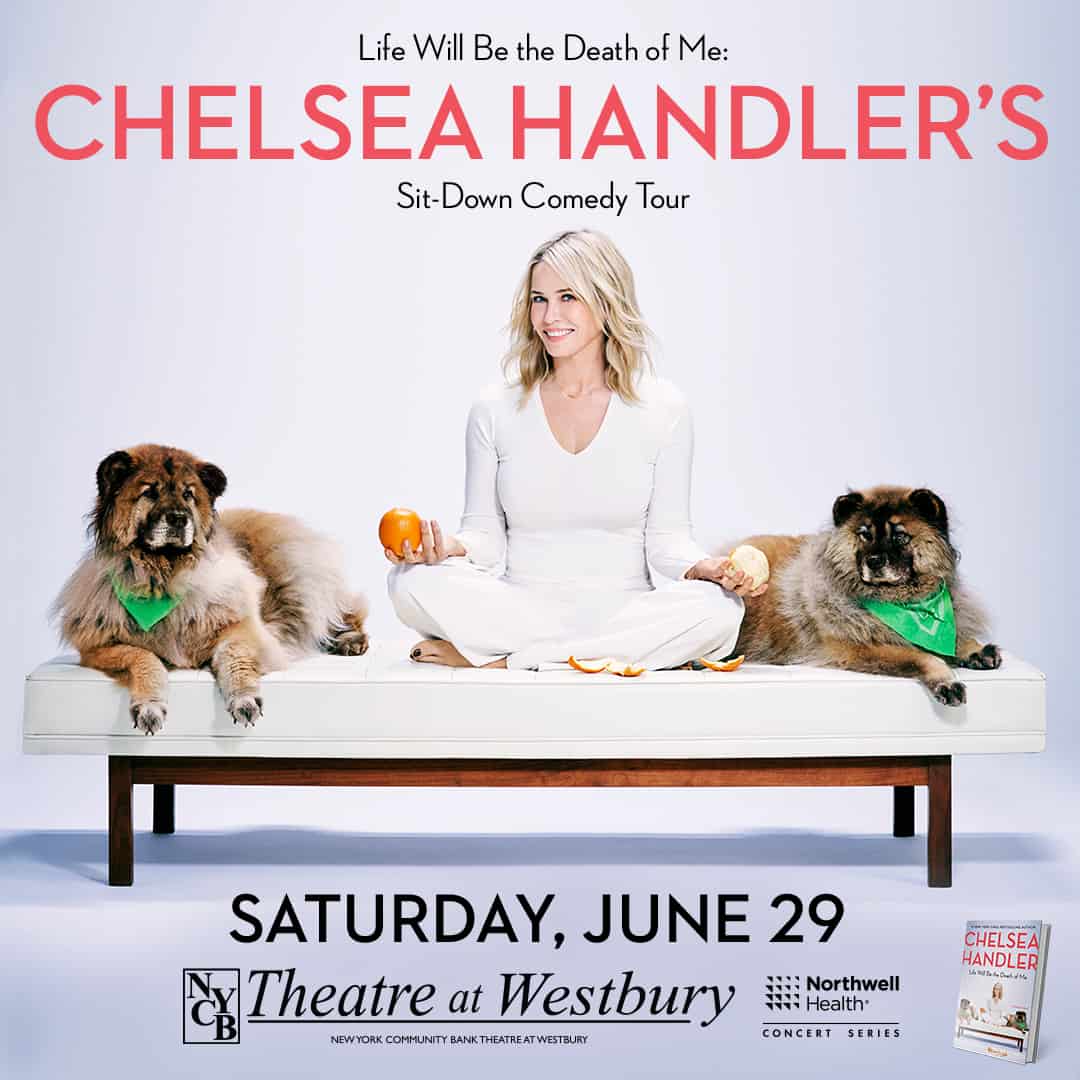 Chelsea Handler sitting on a couch with dogs